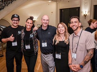 A photo of the Constructable team at a tradeshow meeting other people in the construction industry